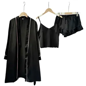 Three-piece black satin sleepwear set with pink piping including robe, cami and shorts