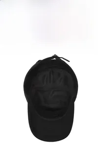 Detail of black flat top hat showing breathable mesh lining and adjustable strap buckle