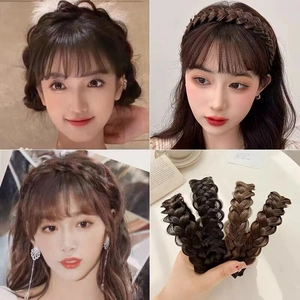 Close-up of wide fishtail braid headbands in natural black and various brown shades