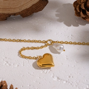 Elegant 18K gold plated stainless steel Y-chain with baroque pearl and heart pendant