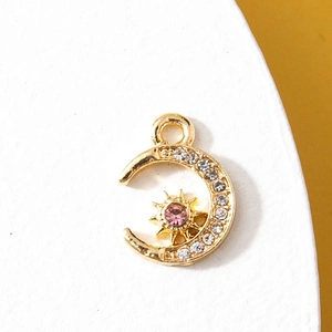Golden crescent moon pendant with rhinestones and pink star gem for DIY jewelry