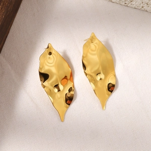 Minimalist 18k gold pleated leaf earrings with irregular textured surface design