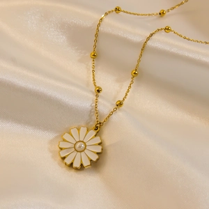 14K gold plated necklace with white daisy flower pendant and pearl on silk fabric