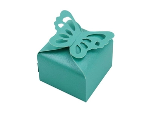Detail of tiffany blue paper gift box with a delicate laser-cut butterfly lid design