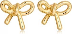 Close-up of golden bow stud earrings with a polished mirror finish on white background