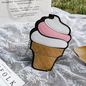 Cute ice cream shaped crossbody chain bag with pink and white leather panels and grass setting