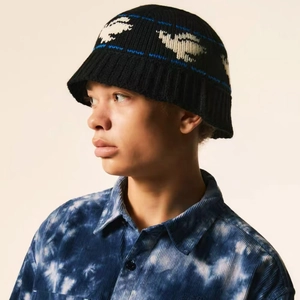 Winter knitted bucket hat with white sheep jacquard pattern and blue stripes