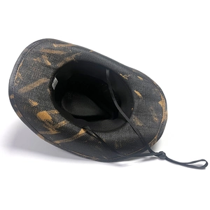 Detail of a black mesh cowboy hat with brown camouflage pattern and adjustable chin strap