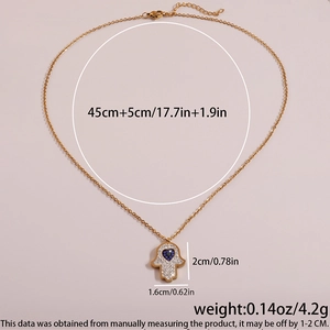 Detail showing Hamsa hand pendant dimensions 2cm by 1.6cm with 45cm plus 5cm chain length