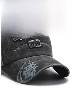 Close-up of vintage washed denim baseball cap with New York 1985 3D embroidery detail