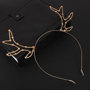 Elegant gold metal reindeer antler headband with sparkling rhinestones for Christmas
