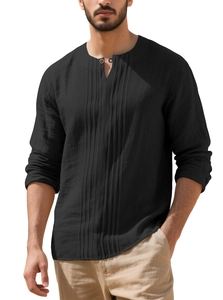Close-up of black cotton linen shirt detailing Henley collar and pleated front design
