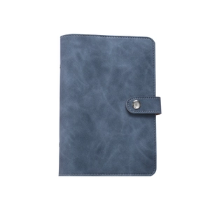 Blue-grey A6 PU leather binder cover with silver magnetic buckle on white background