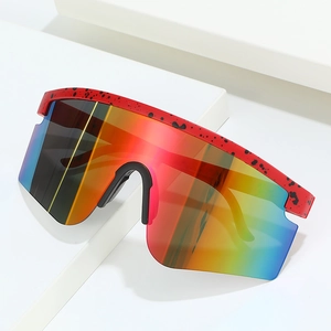 Cycling sports sunglasses with red paint splatter frame and rainbow gradient lenses