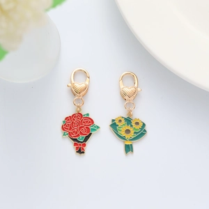Floral zinc alloy keychain set with red rose and sunflower charms on gold lobster clasps