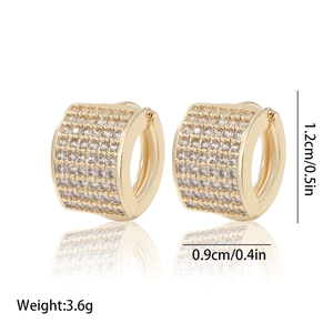 Detail view of gold-plated hoop earrings with five rows of sparkling cubic zirconia
