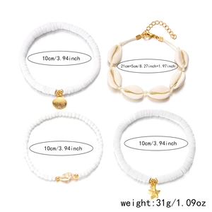Detail view of four-piece summer anklet set with starfish shell charms and white beads