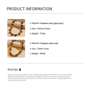 Infographic showing material and size specs for amber resin heart beaded necklaces