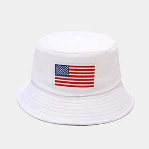 Close-up of the American flag embroidery on a white cotton twill bucket hat's front