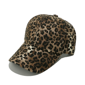 Detailed view of leopard print baseball cap with six-panel crown and curved brim