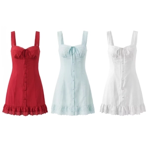 Three summer dresses with lace trim and bow ties in red, light blue, and white colors
