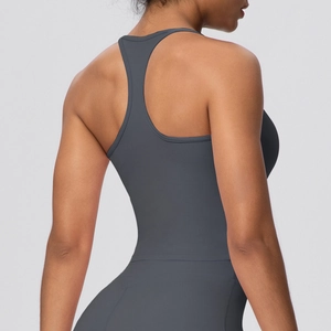 Macro detail of charcoal grey racerback sports bra showing elastic high-stretch fabric