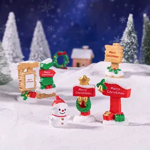 Miniature Christmas resin figurine set with snowman and Merry Christmas signposts