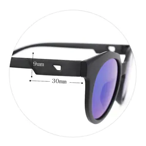 Black matte kids sunglasses with purple polarized lenses and custom logo temple detail