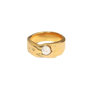 18K gold plated stainless steel lava ring featuring a central white round pearl