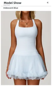 Detail of magic blue racerback sports top with a layered mesh skirt and slim fit design