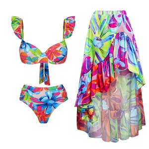 Three-piece bikini set with ruffle straps, high waist bottom and tropical floral print skirt