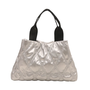 Quilted silver tote bag with black straps and large capacity for daily commuting