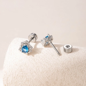 Silver-colored screw-back studs with water-drop blue zircon and small crystals