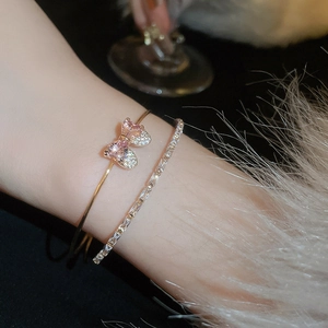 Pink gemstone bow bangle and diamond bracelet set for women in elegant gold finish