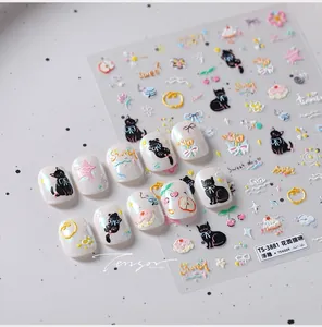 Detail of 3D embossed cat garden nail stickers with cute black cats and floral patterns