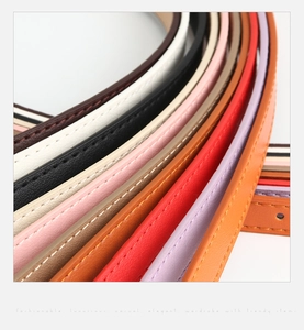 Detail of colorful slim PU leather belts with fine stitching for dresses and sweaters