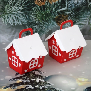 European Christmas candy box in red house shape with snowflake patterns and handles