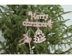 Pink glitter Merry Christmas letters and ballet dancer ornaments hanging on a Christmas tree