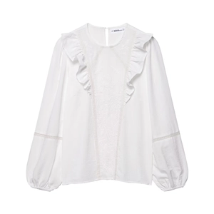 Chemisier blanc à manches longues avec broderie florale, volants et dentelle