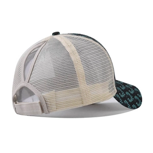Rear view of mesh ponytail baseball cap with floral print and adjustable velcro strap