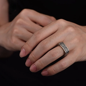 Vintage oxidized silver square signet ring with geometric engraving for men on finger
