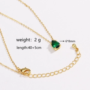 Detail showing gold necklace dimensions with a 6x8mm teardrop green emerald pendant