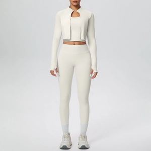 Close-up of the beige yoga set featuring a zip-up jacket and high-waist fitness leggings