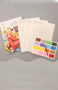 Watercolour painting book set featuring four line drawings, two paint palettes and a brush