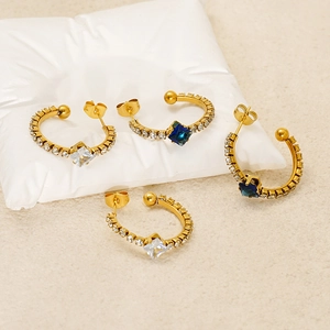 Elegant gold-plated C-shaped earrings with sparkling blue and clear square zircons