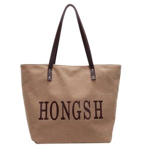 Large capacity khaki canvas tote bag with brown leather handles and HONGSH letter print