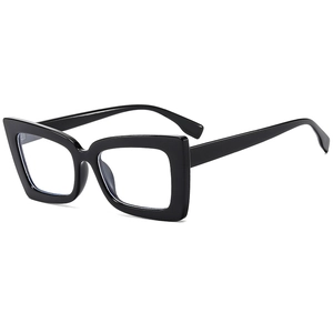 Futuristic black oversized cat-eye sunglasses with thick glossy frames for women