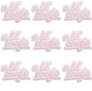 Set of 9 pink and white 'a lil' bougie' embroidered patches with script font lettering