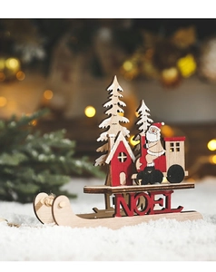 Close-up of wooden Christmas sleigh ornament with Santa and red NOEL base lettering