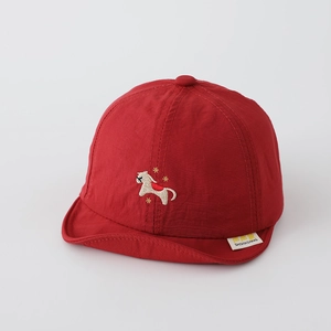 Detail of red baby sun hat with animal embroidery and soft brim for sun protection